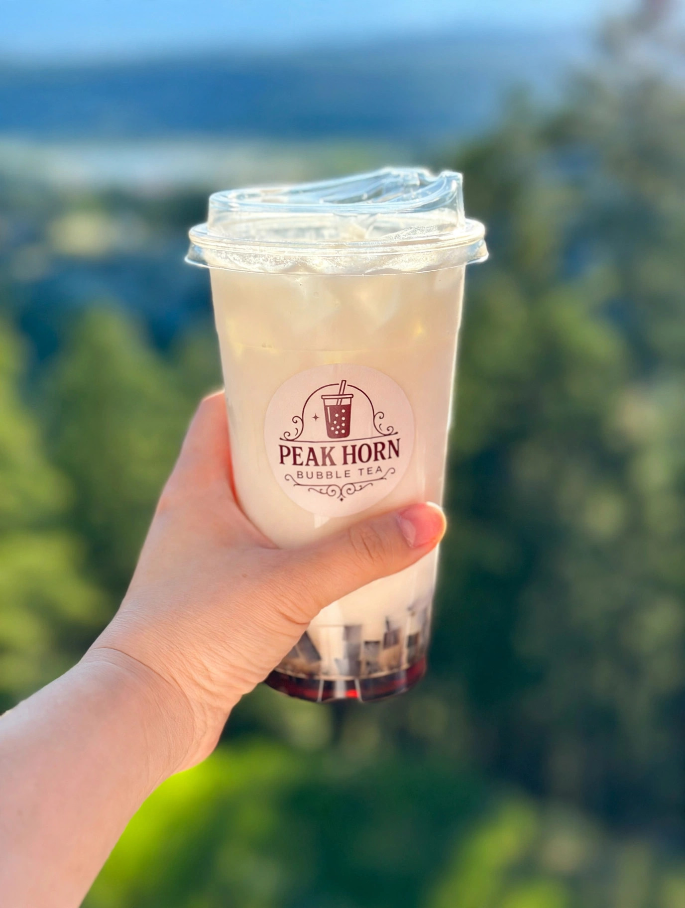 Peak Horn bubble tea with mountain view